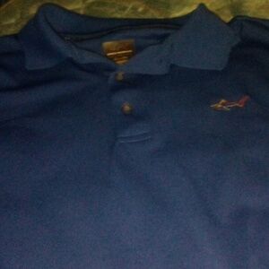 Greg Norman shark golf shirt